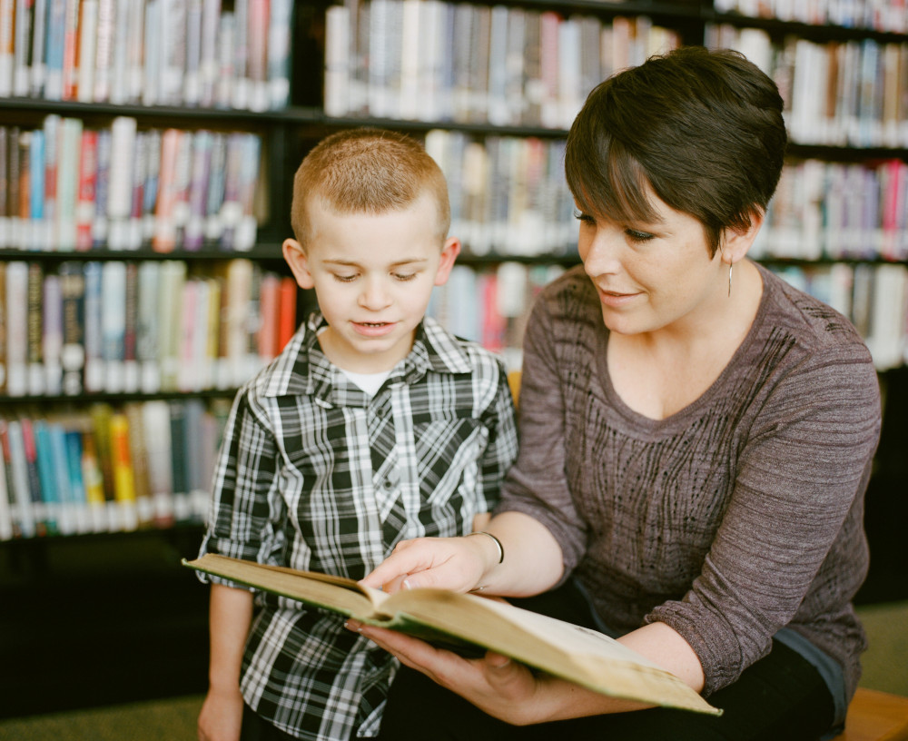 Tutor with young boy